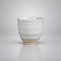 Tasse à thé artisanale en céramique émaillée finition ivoire